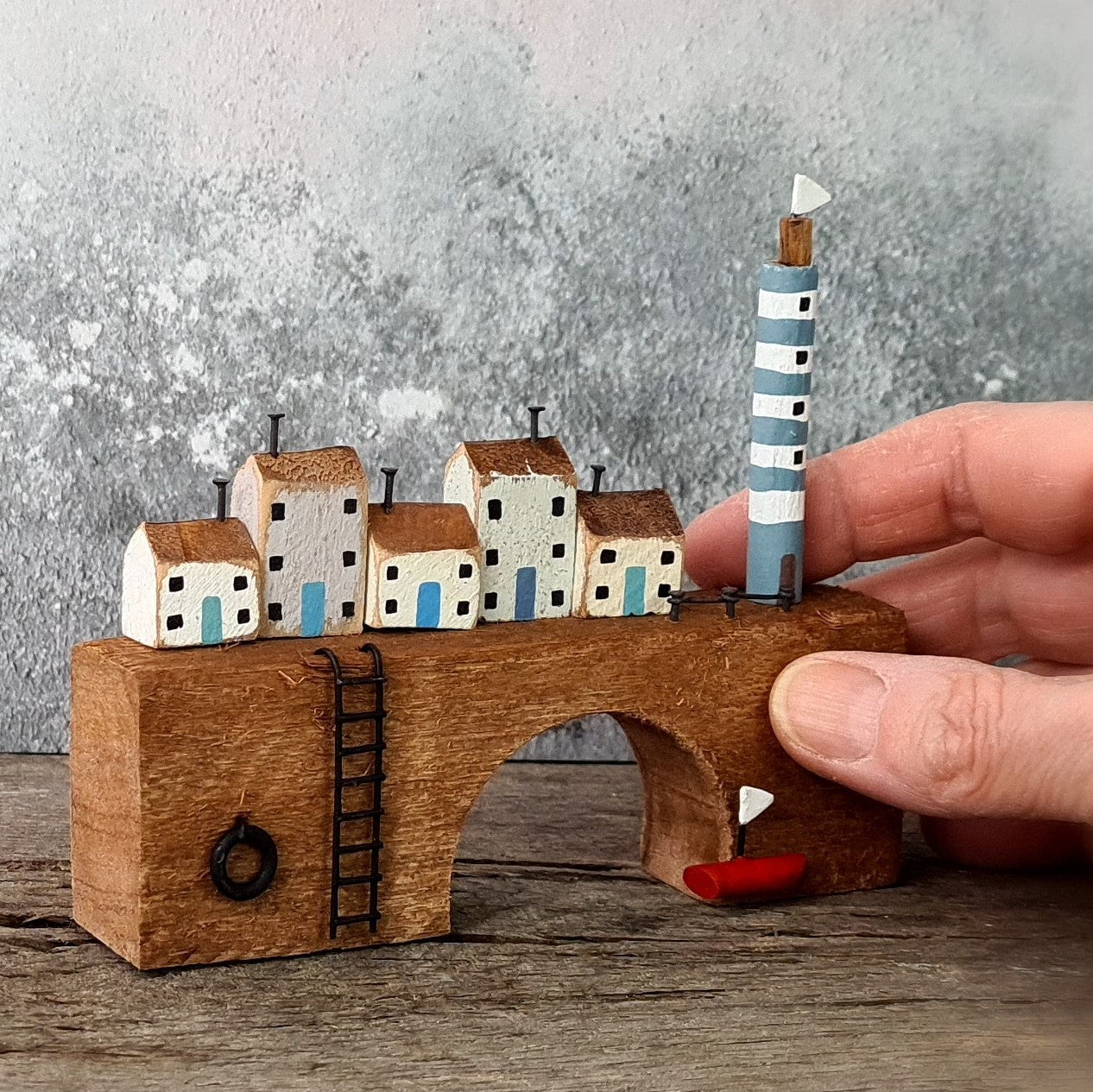 Lighthouse & Cottages on Bridge